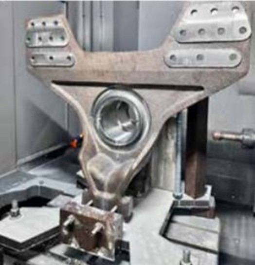 Chassis part held on a machining centre